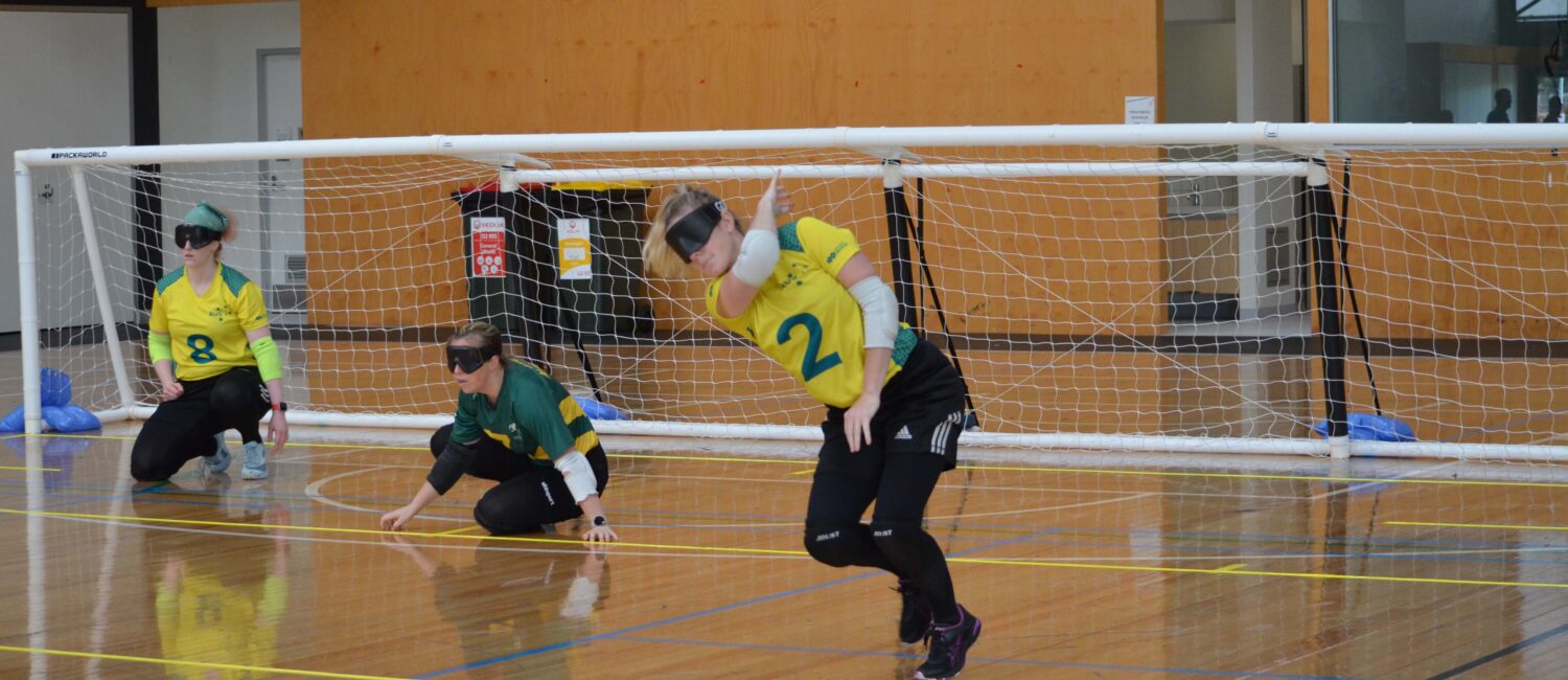 Aussie Belle Goalball athlete releasing throw during training.