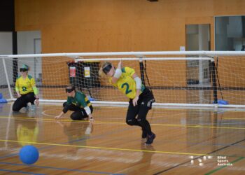 Aussie Belle Goalball athlete releasing throw during training.