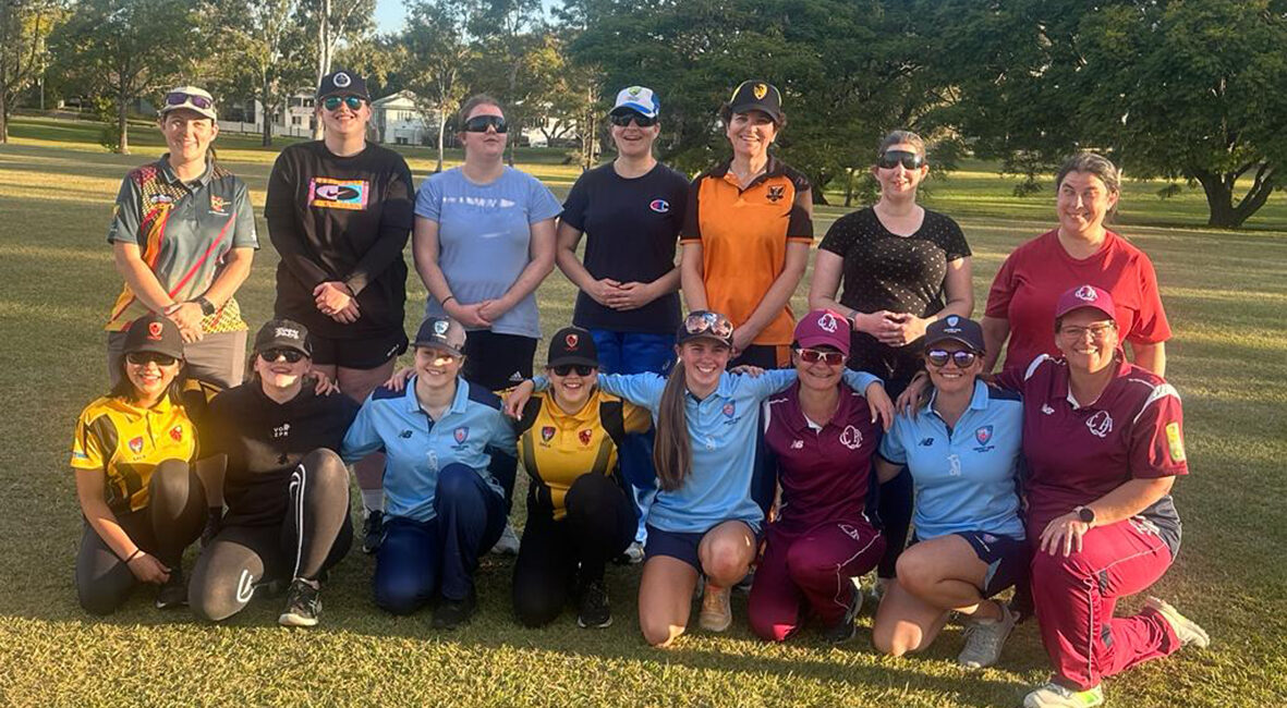 Image of members of the Australian Women's Blind Cricket team, in their state uniforms, at their national training camp