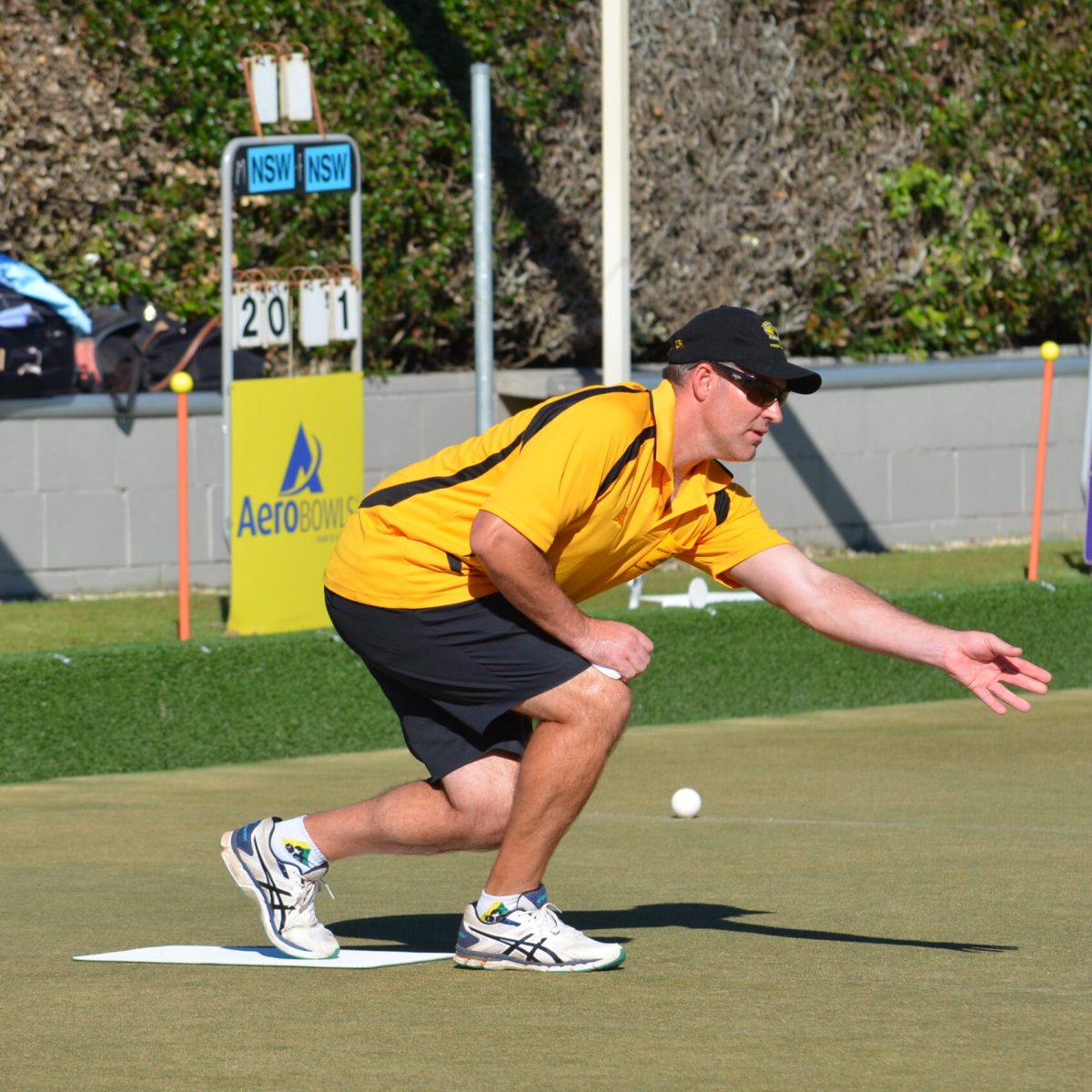Port Macquarie Championships WA representative in the motion of bowling in Port Macquarie